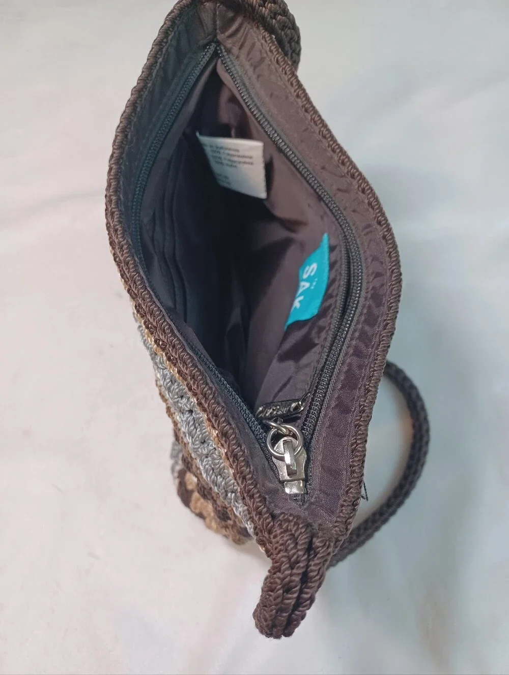 the sak striped crochet knit crossbody shoulder bag brown blue neutral zip